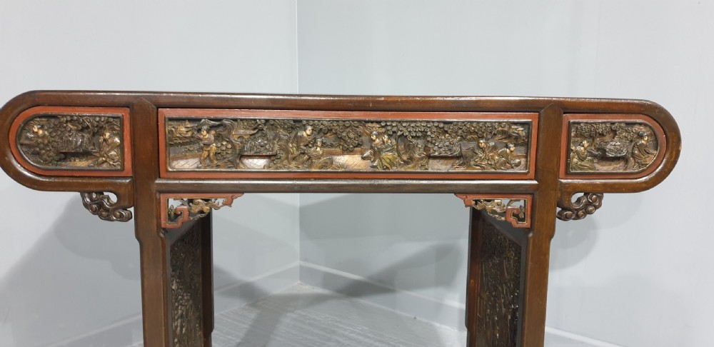 A superb Oriental Carved Alter or Console Table View II