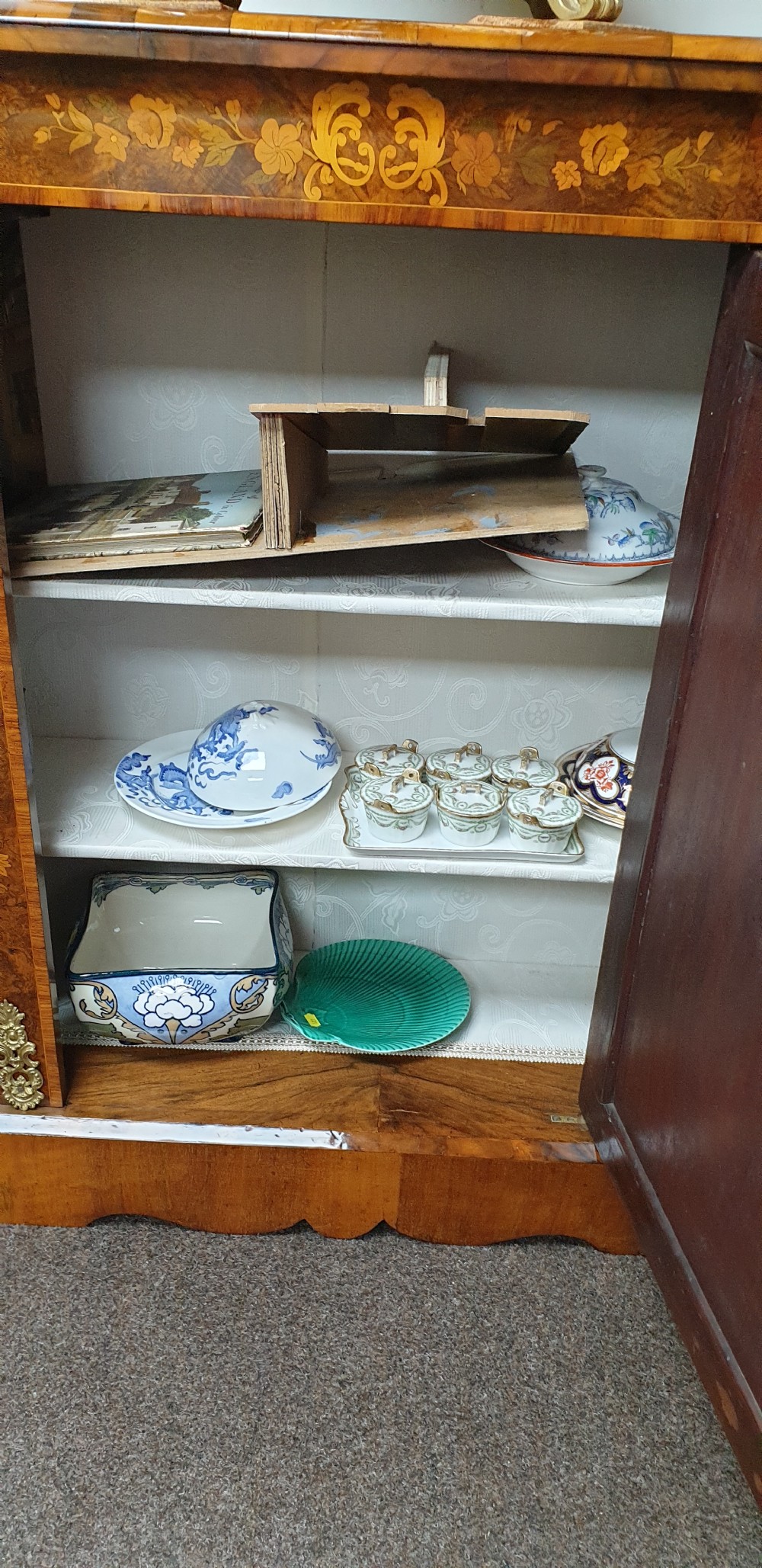 A low burr walnut and floral marquetry credenza bookcase featuring glazed side doors, a central solid panel door, and ornamental gilt-bronze mounts. View XI