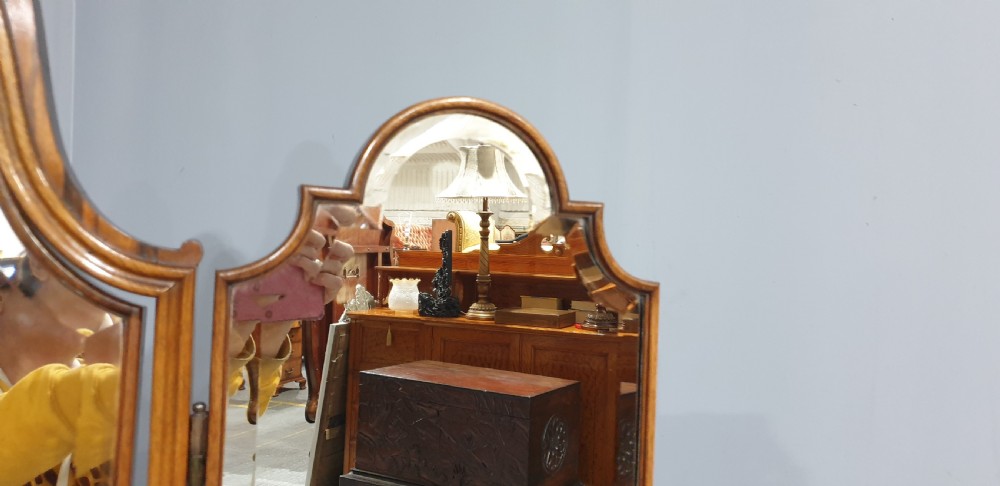 An Edwardian wooden dressing table featuring herringbone parquetry veneers, five drawers, carved legs with a curved stretcher, and an adjustable triple mirror. View VI
