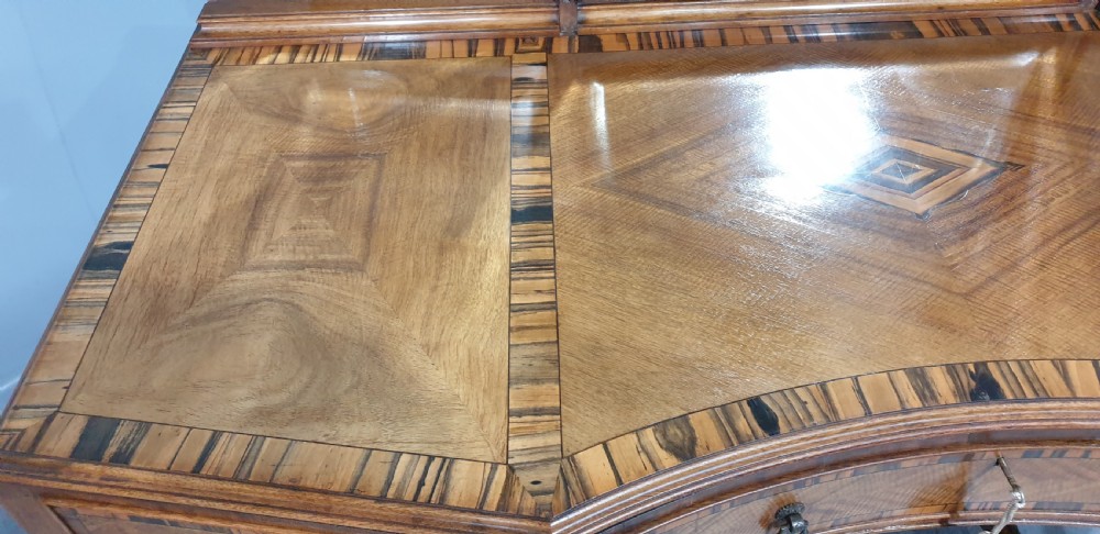 An Edwardian wooden dressing table featuring herringbone parquetry veneers, five drawers, carved legs with a curved stretcher, and an adjustable triple mirror. View VII