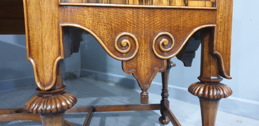 An Edwardian wooden dressing table featuring herringbone parquetry veneers, five drawers, carved legs with a curved stretcher, and an adjustable triple mirror. View XIV