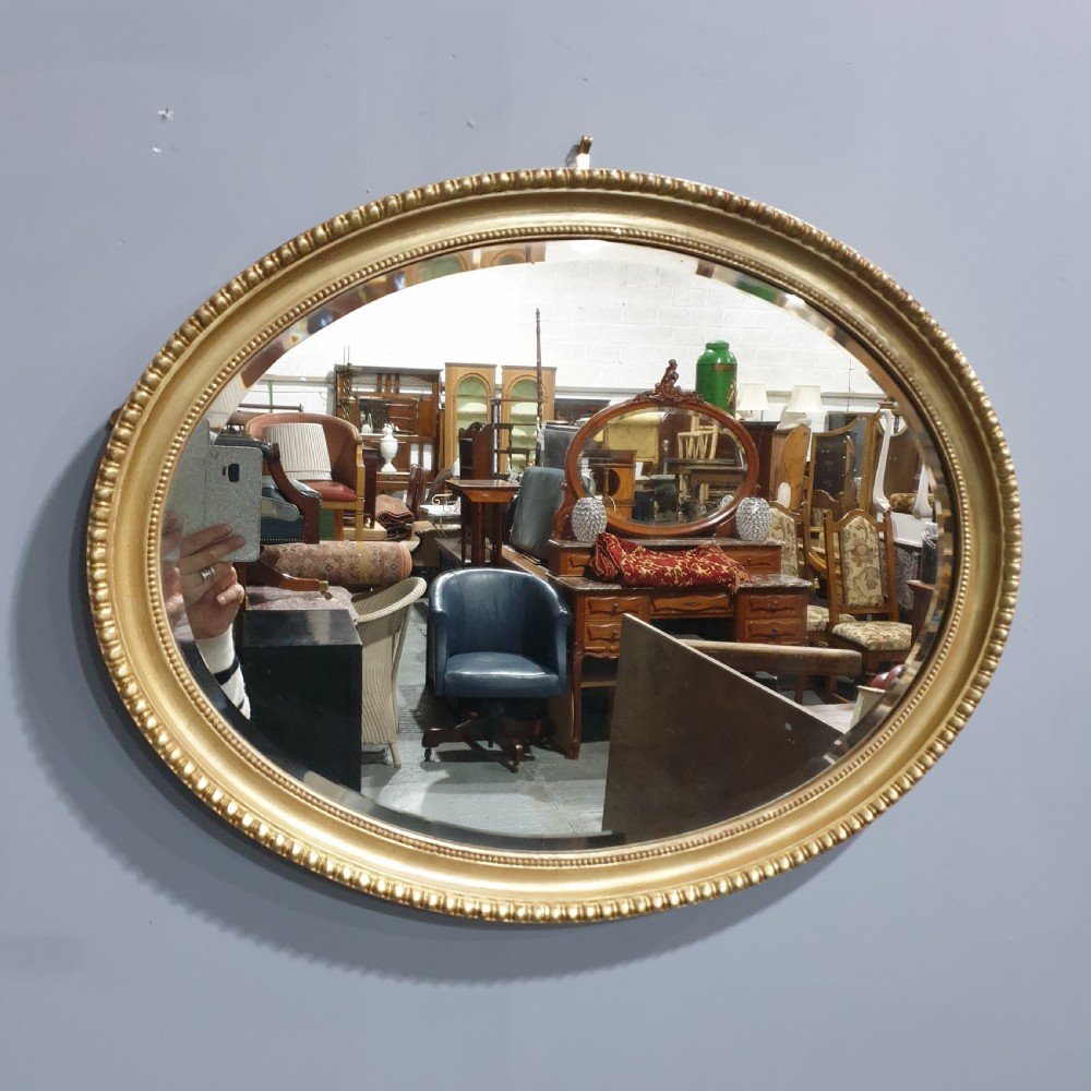 English Gilt Oval Wall Mirror