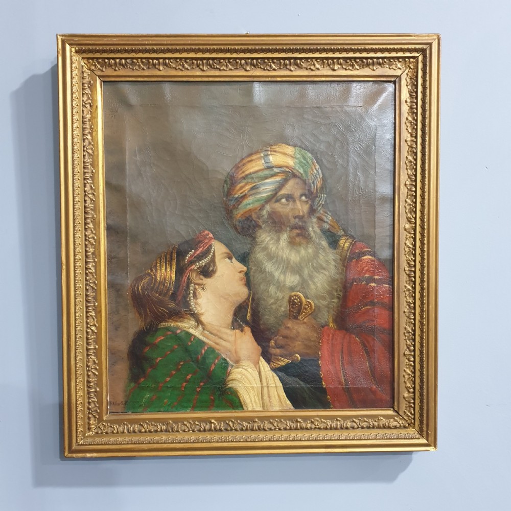 An antique framed oil painting on canvas depicting a bearded man in a turban alongside a woman looking upward. View II