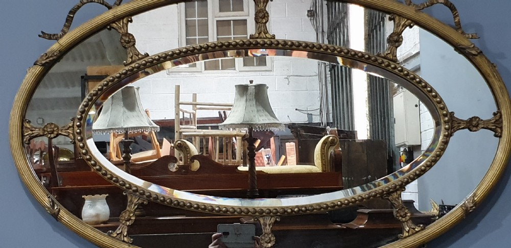 English Regency Oval Gilt Mirror View III