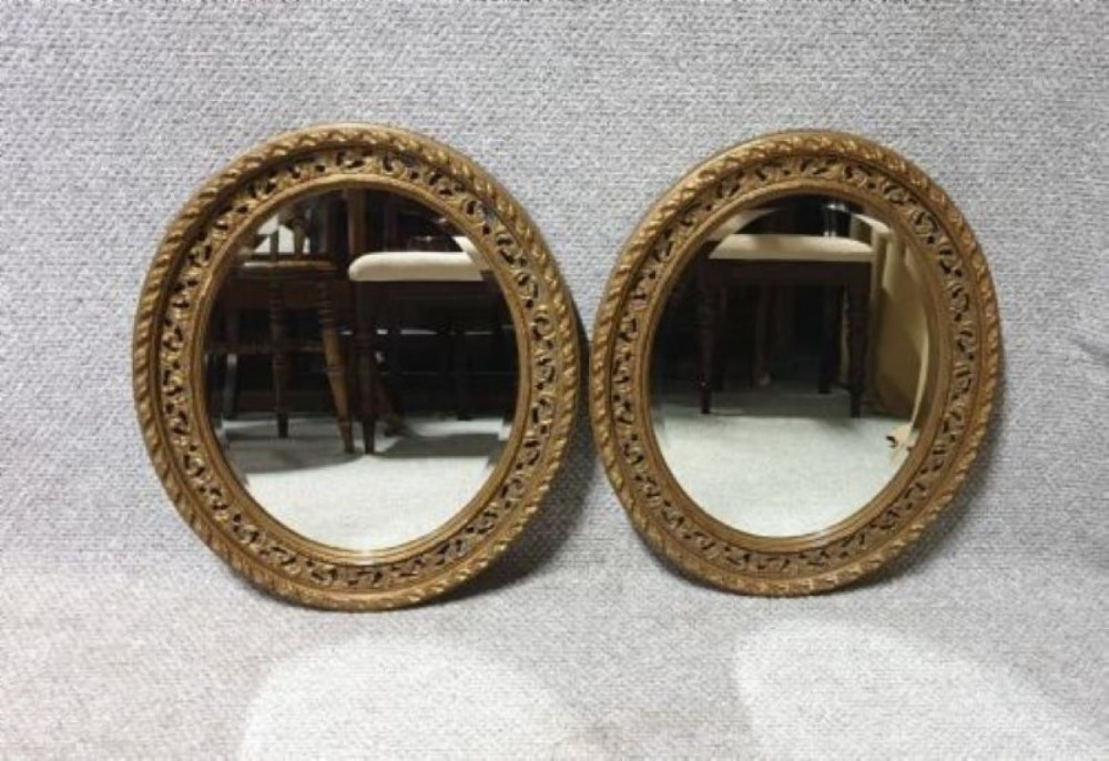 Excellent Pair of Gilt Oval Mirrors