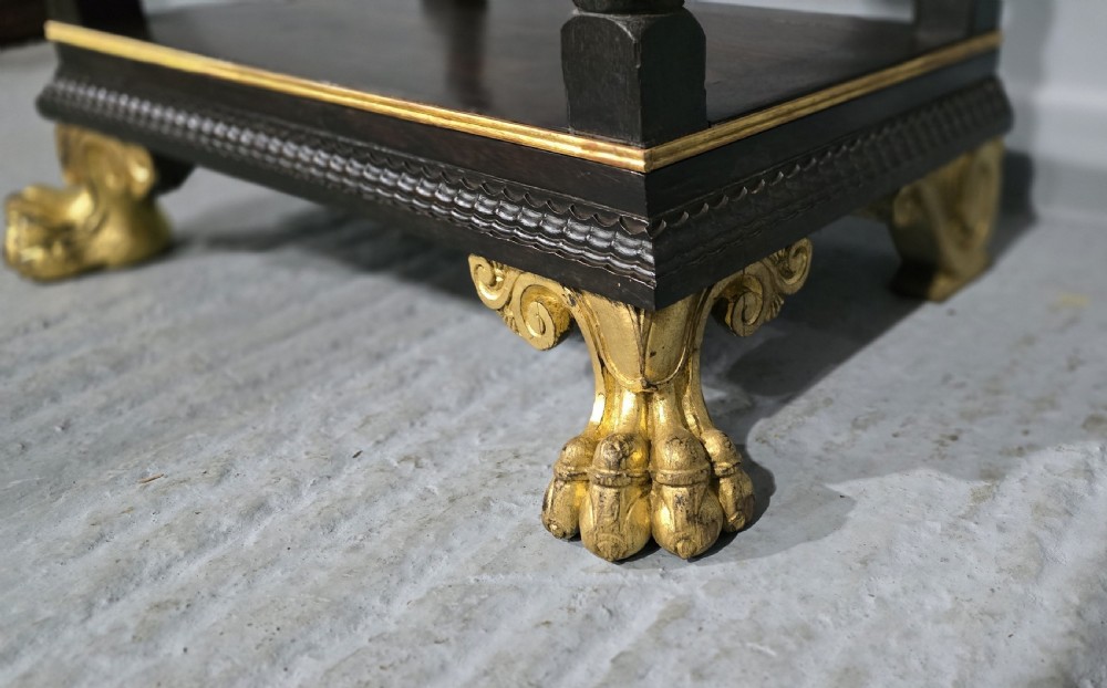 A rectangular dark rosewood two-tier side table featuring spiral turned legs, gilt borders, and carved gilded paw feet. View XI