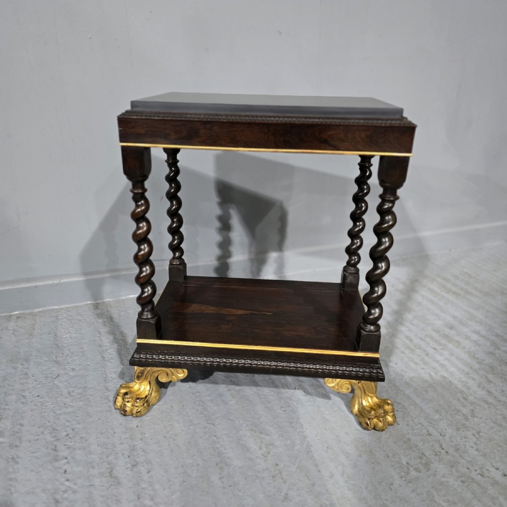 A rectangular ebonised black wood centre table featuring gold parcel gilded accents, spiral barley twist legs, drop finials, and an H-stretcher. View XIII