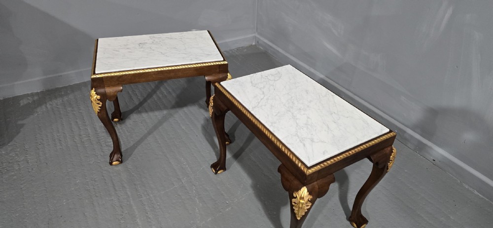 A pair of rectangular dark mahogany lamp tables featuring white marble inset tops, gilded acanthus leaf carvings, and carved cabriole legs with ball and claw feet. View IX