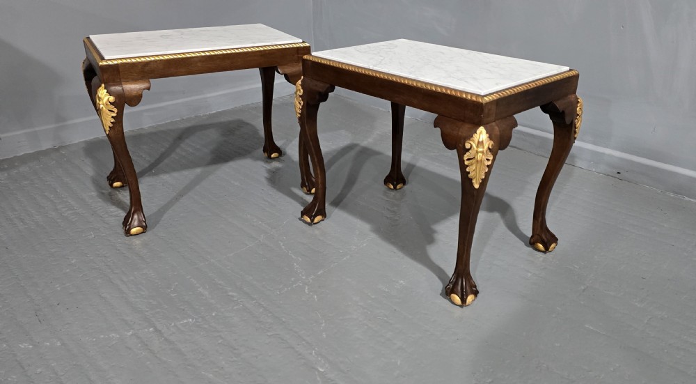 A pair of rectangular dark mahogany lamp tables featuring white marble inset tops, gilded acanthus leaf carvings, and carved cabriole legs with ball and claw feet. View XI
