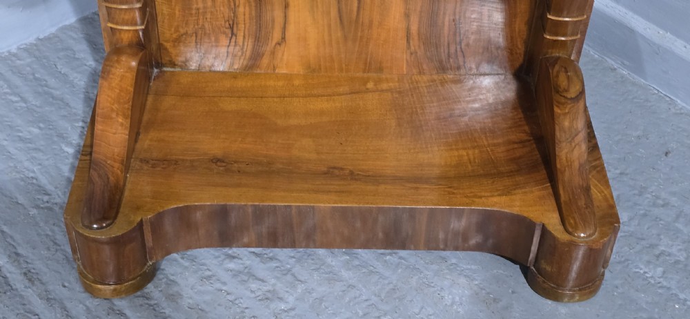 A nineteenth-century walnut console table featuring a grey-and-white mottled marble top supported by scrolling front legs and a solid base. View III
