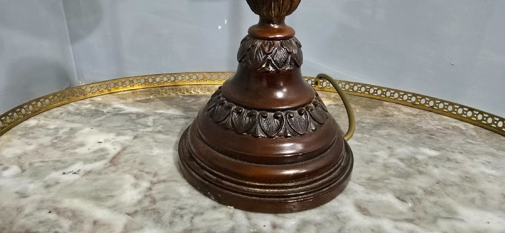A pair of classic French bronzed table lamps featuring detailed column bases and cream pleated shades. View VI