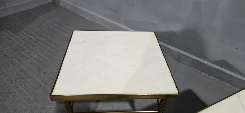 A pair of square French lamp tables with fluted brass legs, thin stretchers, and inset white marble tops. View V