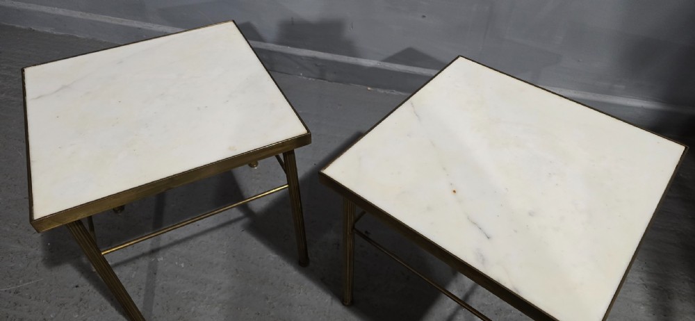A pair of square French lamp tables with fluted brass legs, thin stretchers, and inset white marble tops. View VII