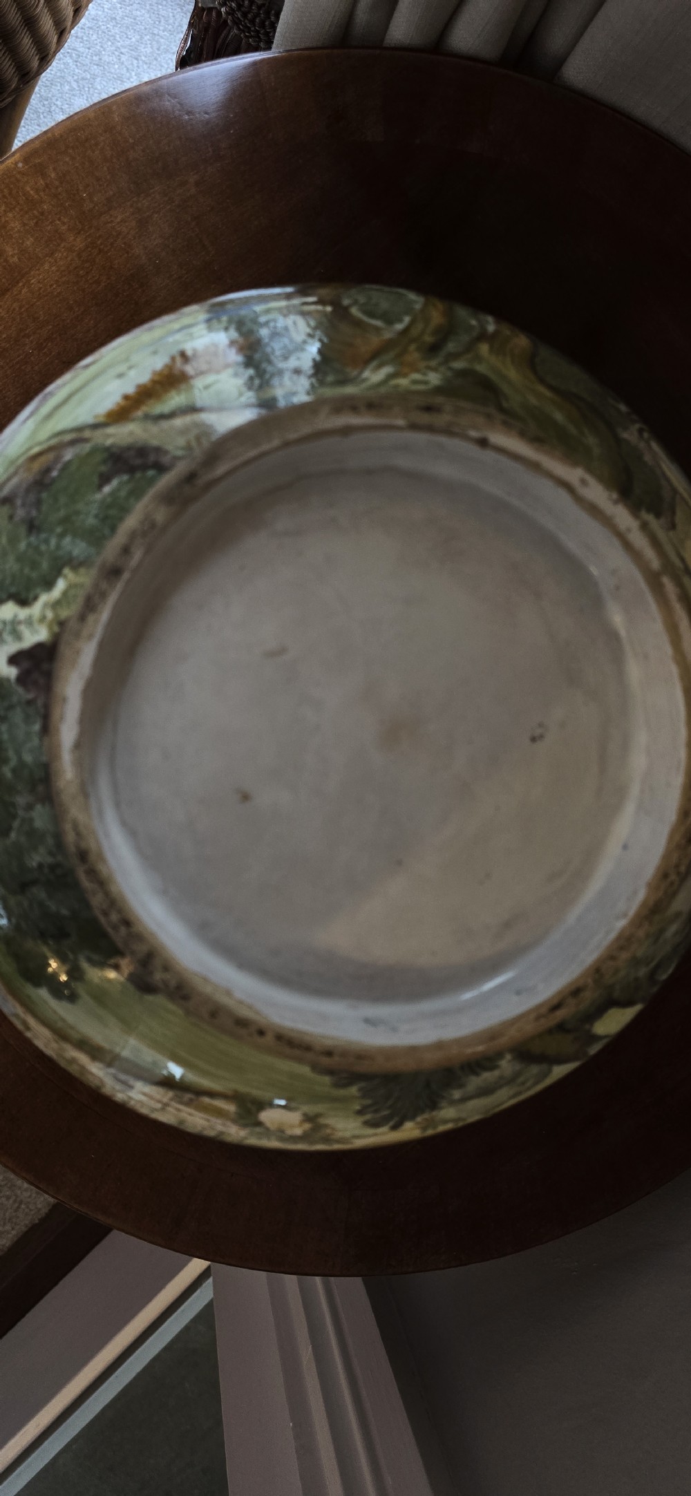 An 18th-century Italian tin-glazed earthenware lidded jar decorated with painted classical landscapes, cherubs, and architectural ruins. View XV