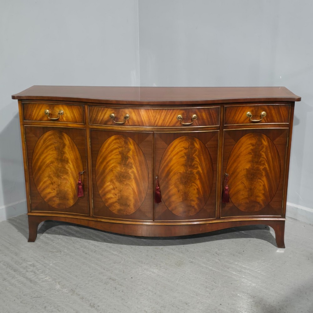 Superb Serpentine Mahogany Sideboard
