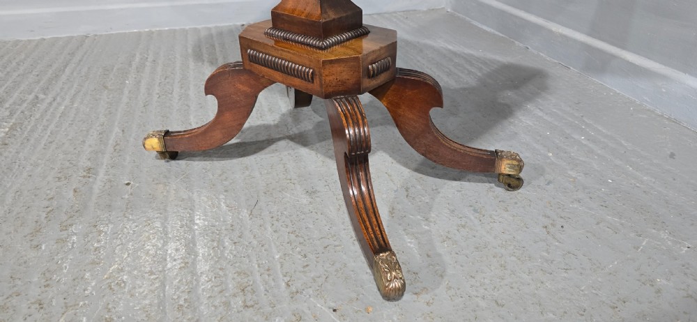A Regency brass inlaid wooden card table featuring a fold-over top, central pedestal column, and four splayed legs with brass paw feet. View XIII