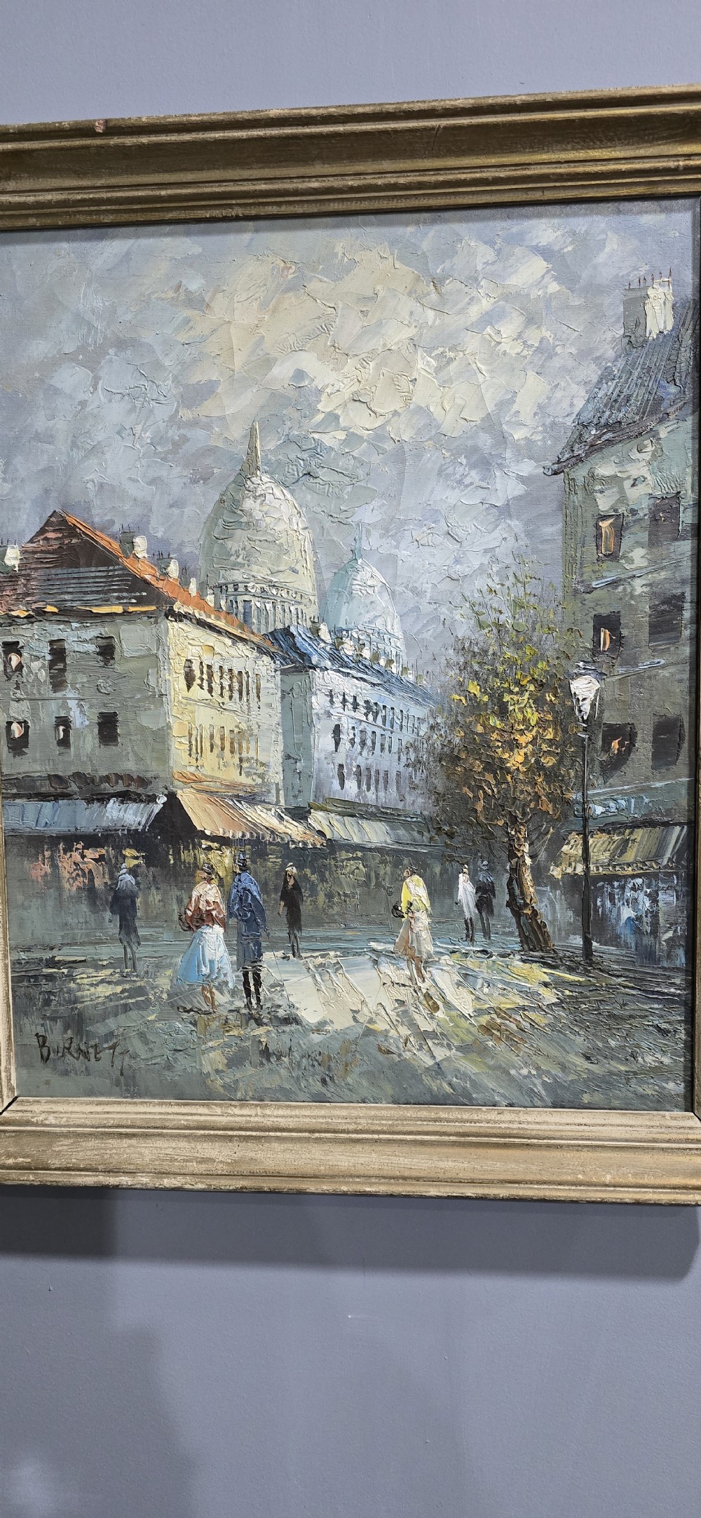 A framed oil painting depicting a Paris street scene with Sacre-Cur in the background, rendered in textured impasto brushstrokes. View III