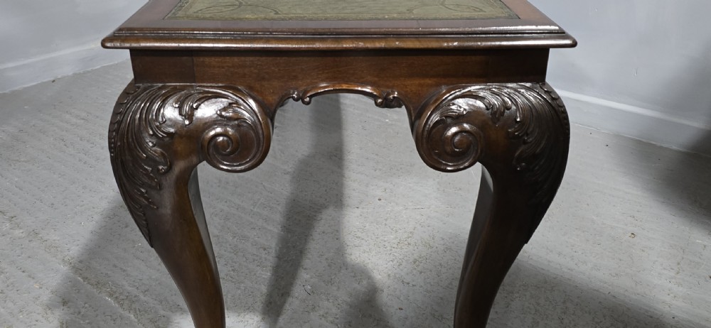 A mahogany console table featuring a green gold-tooled leather inset top and carved cabriole legs ending in ball-and-claw feet. View XIII
