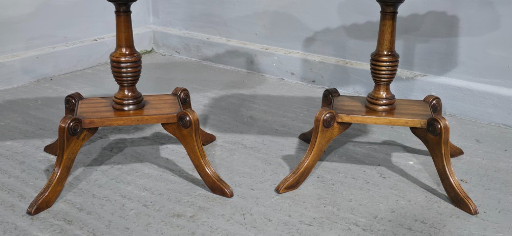 A pair of matching English walnut wine tables featuring gallery tops with wood inlay, turned central pedestals, and splayed legs. View II