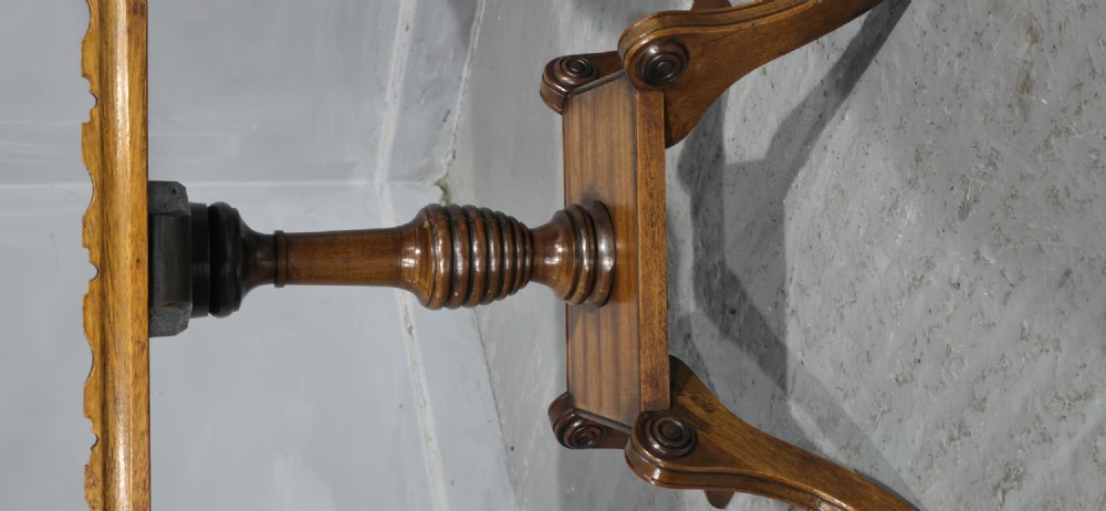 A pair of matching English walnut wine tables featuring gallery tops with wood inlay, turned central pedestals, and splayed legs. View IV