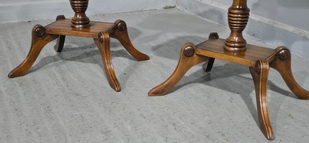 A pair of matching English walnut wine tables featuring gallery tops with wood inlay, turned central pedestals, and splayed legs. View VI