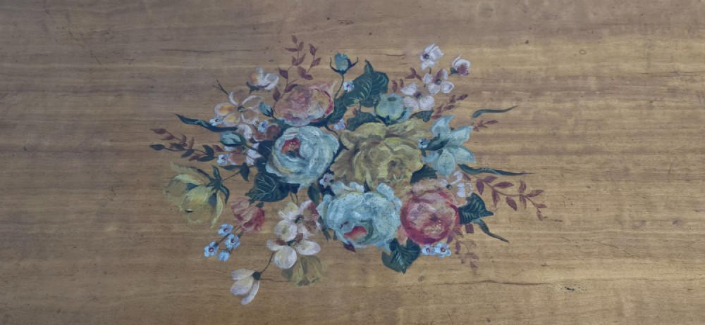 An antique painted satinwood Pembroke table featuring two drop leaves, hand-painted floral borders, turned tapering legs, and a single frieze drawer. View XII