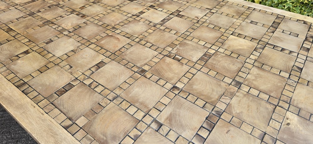 A large rectangular French refectory dining table featuring a patterned parquet timber top, square block legs, and a low stretcher base. View XI