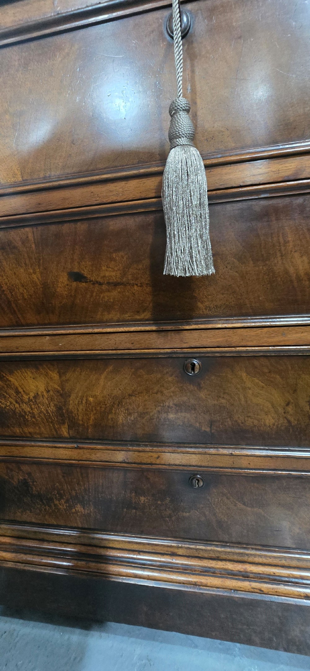 A nineteenth-century French walnut commode with four drawers, turned knobs, and a flat top. View VII