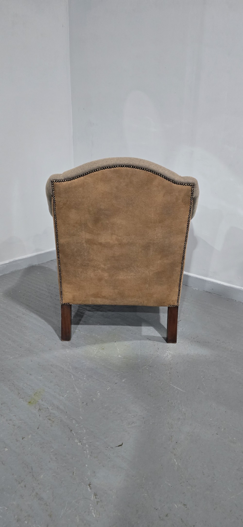 A traditional upholstered armchair in neutral taupe wool featuring carved mahogany cabriole front legs and claw-and-ball feet. View VI