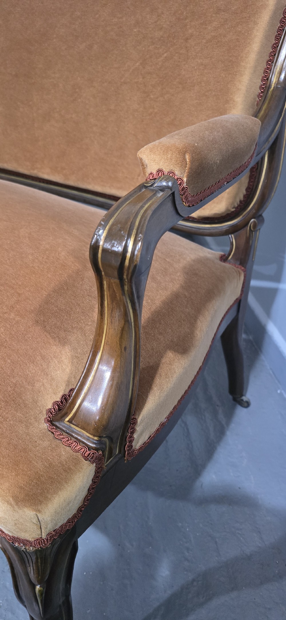 A French Louis XV style carved walnut settee with warm amber velvet upholstery, serpentine seat rail, and cabriole legs. View XIII