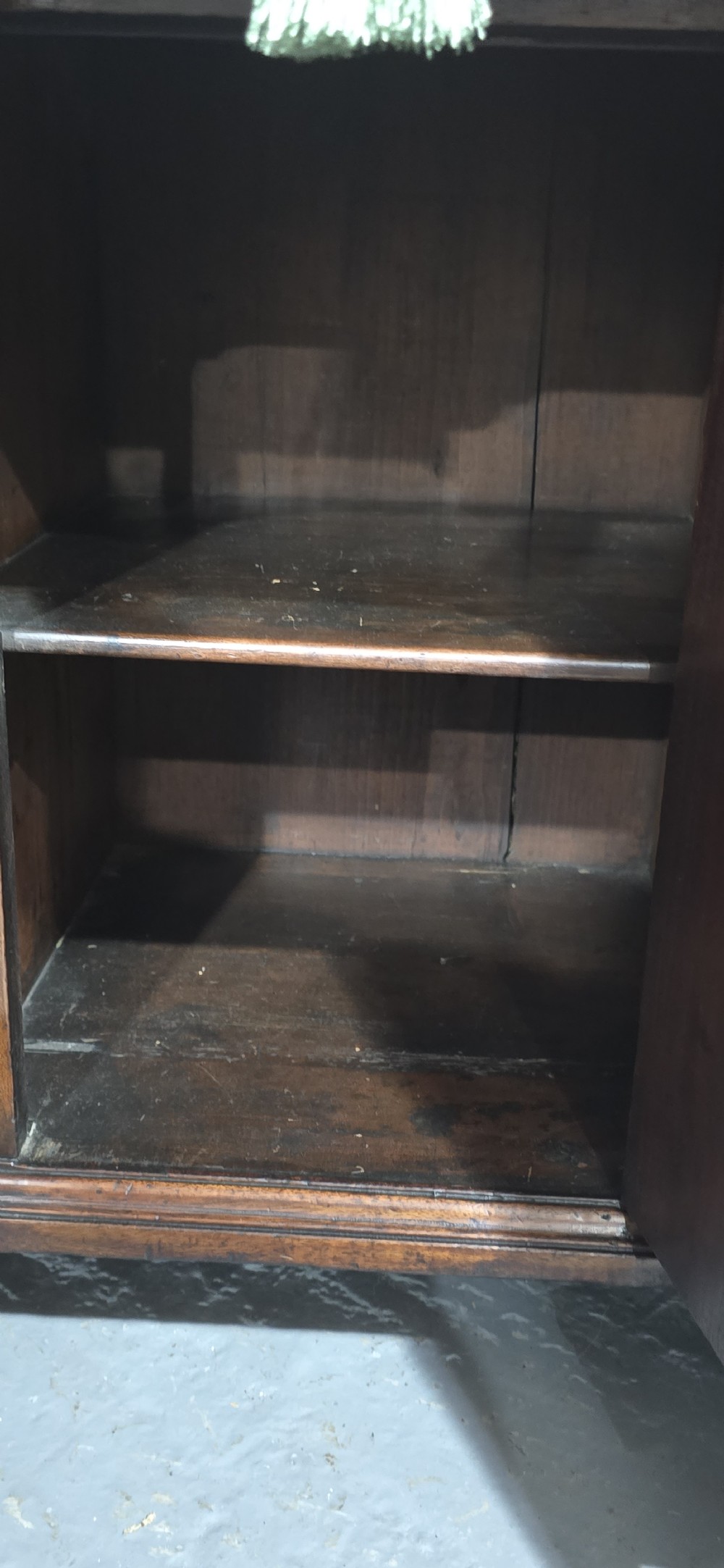 A Georgian mahogany kneehole desk featuring a long top drawer, six side drawers, a central recessed cupboard, brass swan-neck handles, and bracket feet. View XIII