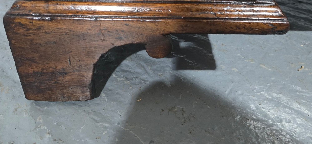 A Georgian mahogany kneehole desk featuring a long top drawer, six side drawers, a central recessed cupboard, brass swan-neck handles, and bracket feet. View XVI