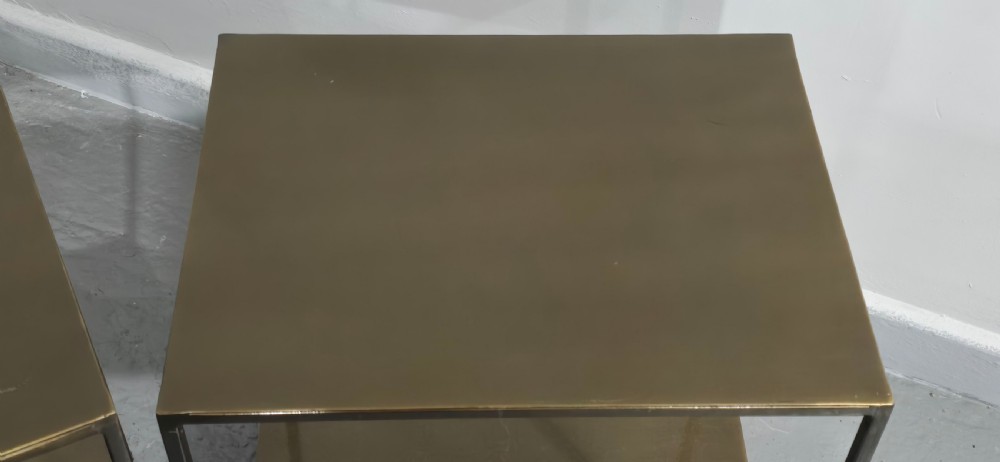 A pair of rectangular dark bronzed metal lamp tables featuring slender square legs and an integrated lower tier shelf. View IV