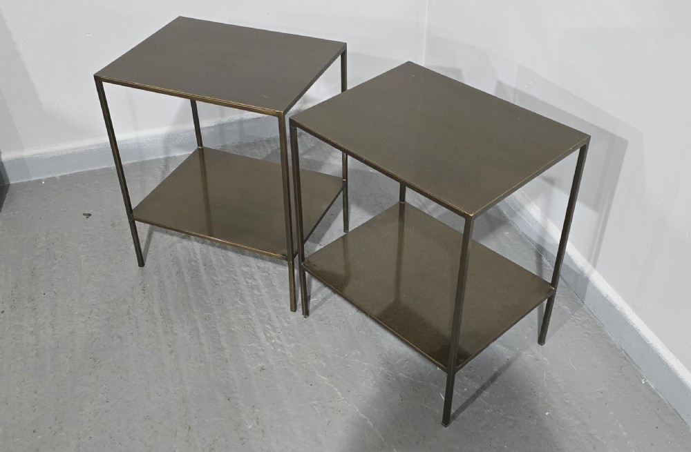 A pair of rectangular dark bronzed metal lamp tables featuring slender square legs and an integrated lower tier shelf. View VIII