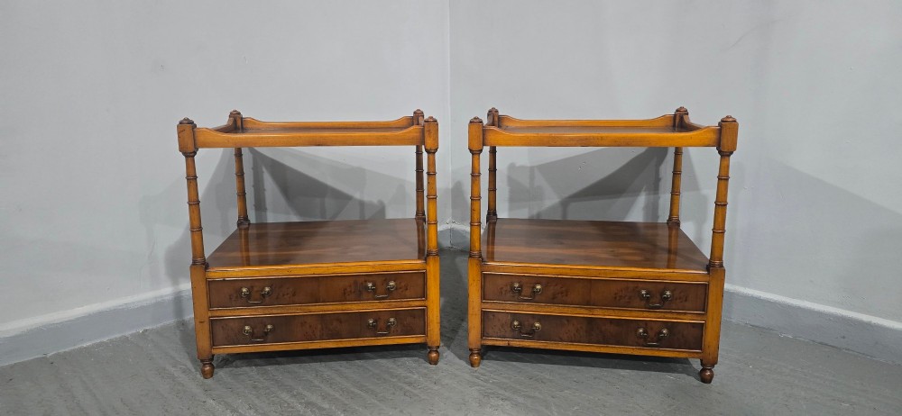 A pair of yew wood lamp tables featuring dark green leather inset tops, a middle shelf, two drawers with brass handles, and turned corner columns. View III