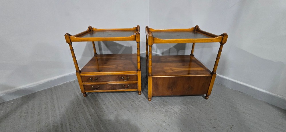 A pair of yew wood lamp tables featuring dark green leather inset tops, a middle shelf, two drawers with brass handles, and turned corner columns. View XI