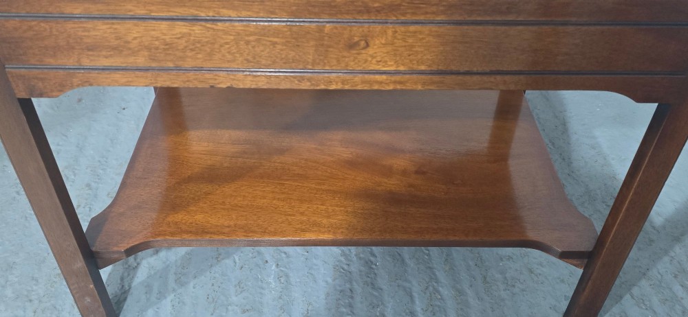 A pair of solid mahogany lamp end tables featuring tray tops, single drawers with brass handles, and lower tier shelves. View XIV