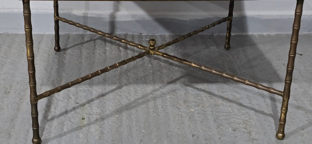A rectangular French coffee table featuring a white veined marble top resting on a gilt brass faux-bamboo frame with an X-shaped stretcher. View II
