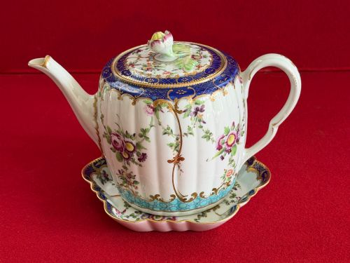 A First Period Worcester Porcelain Barrel Shaped Teapot & Stand C.1780