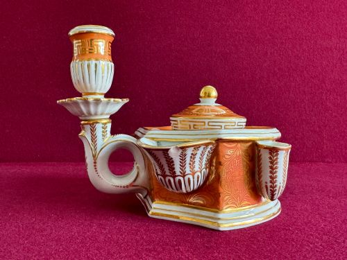 fig 1. A Regency Flight & Barr Worcester porcelain inkstand painted with realistic seashell panels, gilded borders, quill holders, and a central candlestick.