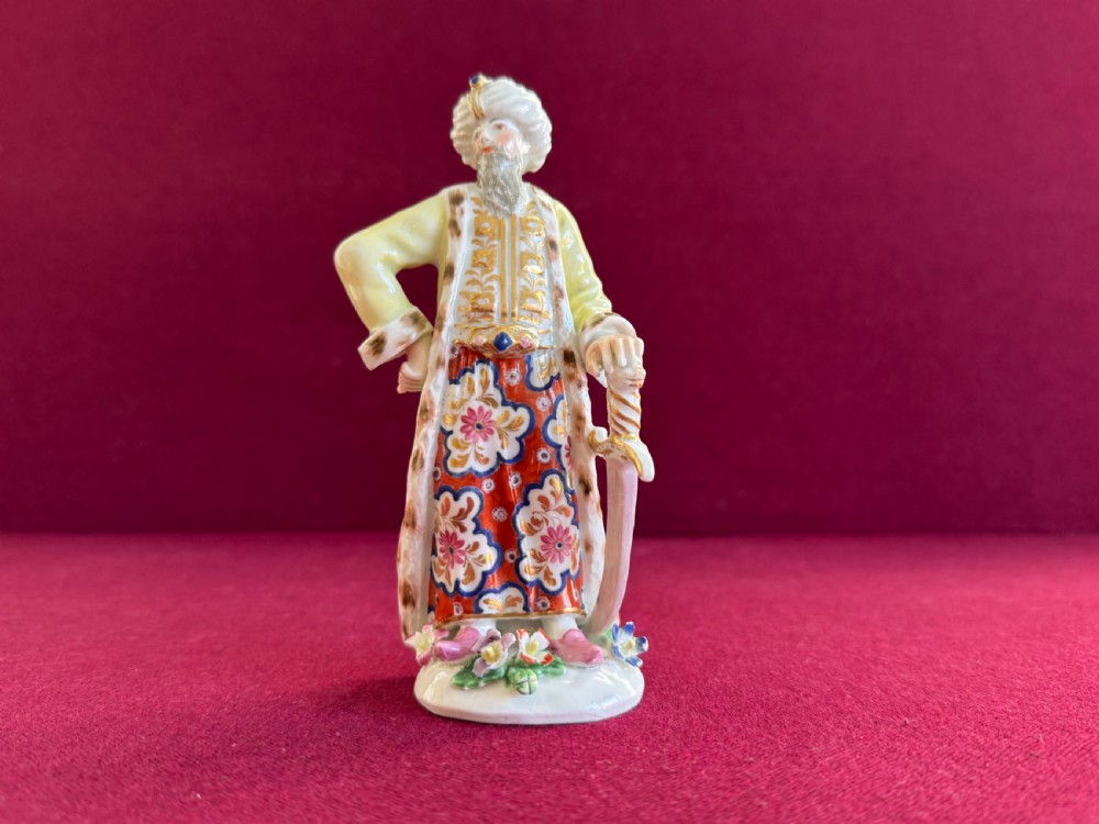 A rare First Period Worcester porcelain figure of a Turk c.1765 - 1770