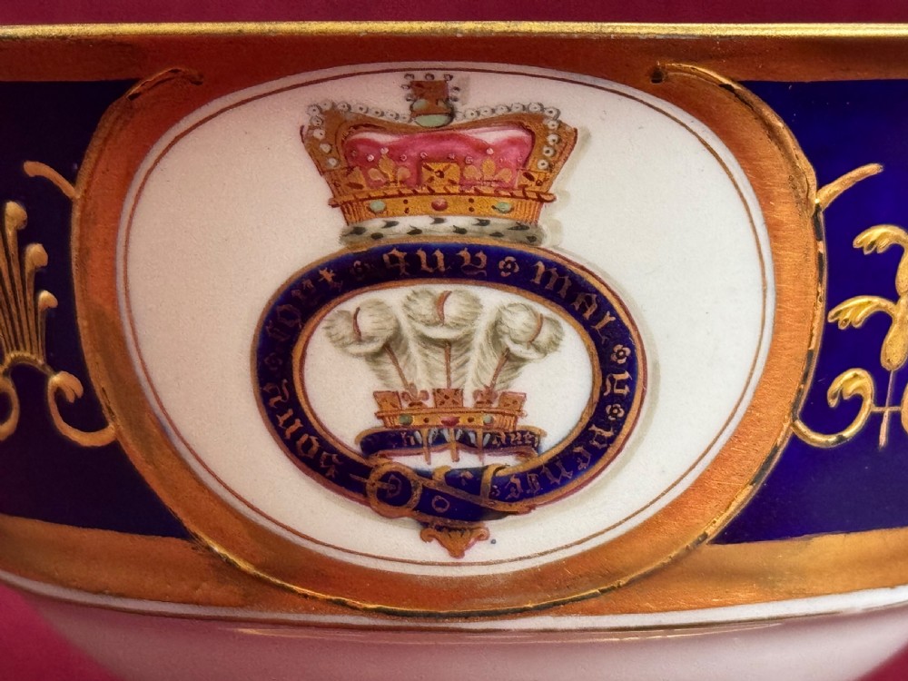 A Flight, Barr and Barr Worcester porcelain cup and saucer featuring cobalt blue ground, gilt palmette borders, and the Prince of Wales crest. View IX