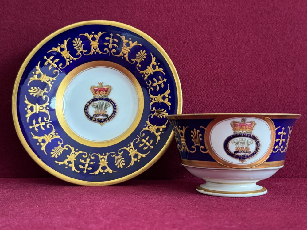 A Flight, Barr and Barr Worcester porcelain cup and saucer featuring cobalt blue ground, gilt palmette borders, and the Prince of Wales crest. View XI