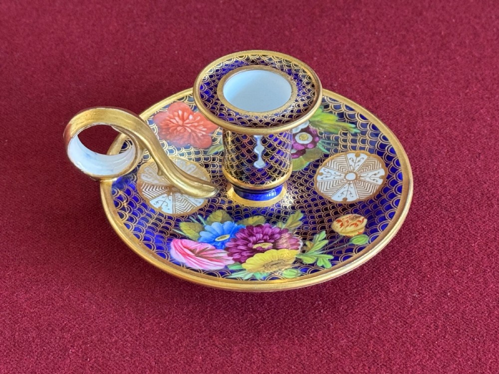 A Regency period Spode porcelain chamber candlestick decorated with a cobalt blue scale pattern, gilt trim, and hand-painted floral panels. View III