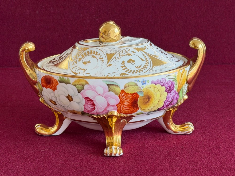 A Regency John Rose Coalport porcelain sauce tureen decorated with hand-painted flowers, gilded scroll handles, and a matching lid. View III
