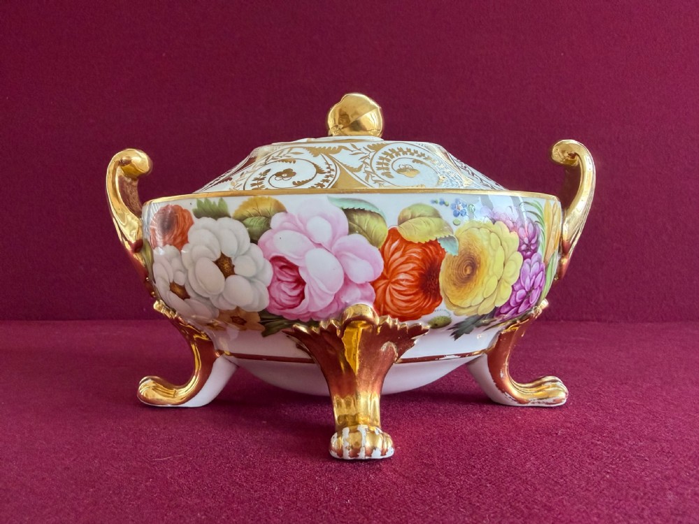 A Regency John Rose Coalport porcelain sauce tureen decorated with hand-painted flowers, gilded scroll handles, and a matching lid. View VII