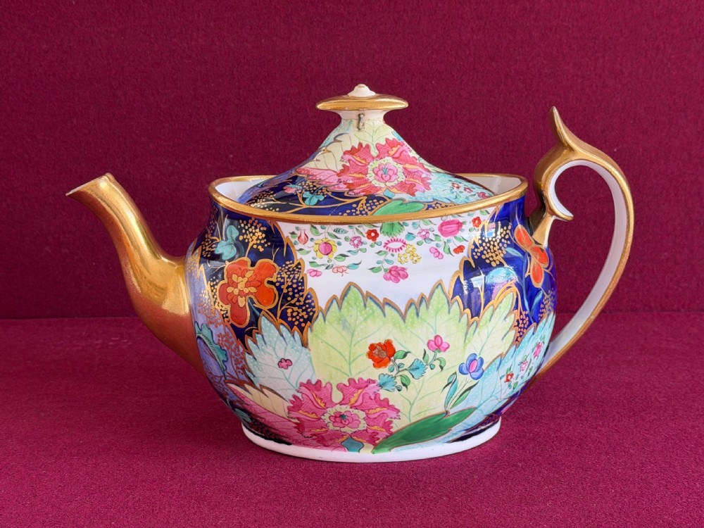 A rare Spode of New Oval Shape Teapot decorated in the Tobacco Leaf Pattern 1698 c.1812