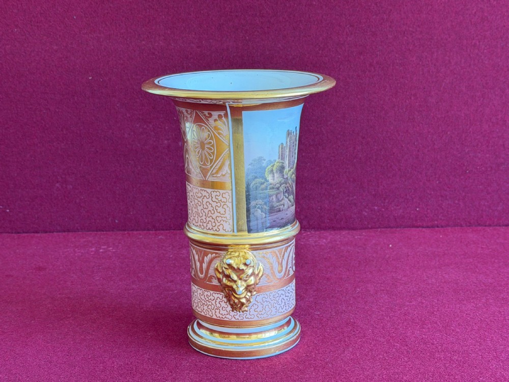 A Regency Barr, Flight and Barr Worcester porcelain spill vase featuring a hand-painted landscape panel of Ballyhooly Castle, gold lion-mask side handles, and gilt classical ornamentation. View III