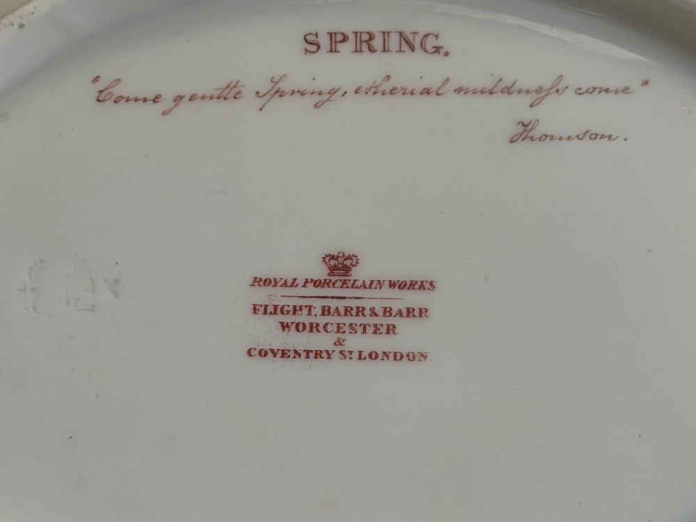 An apple green lobed porcelain basket with a gold overhead handle, gadrooned gilded border, and hand-painted central vignette of a classical figure and butterflies. View VIII