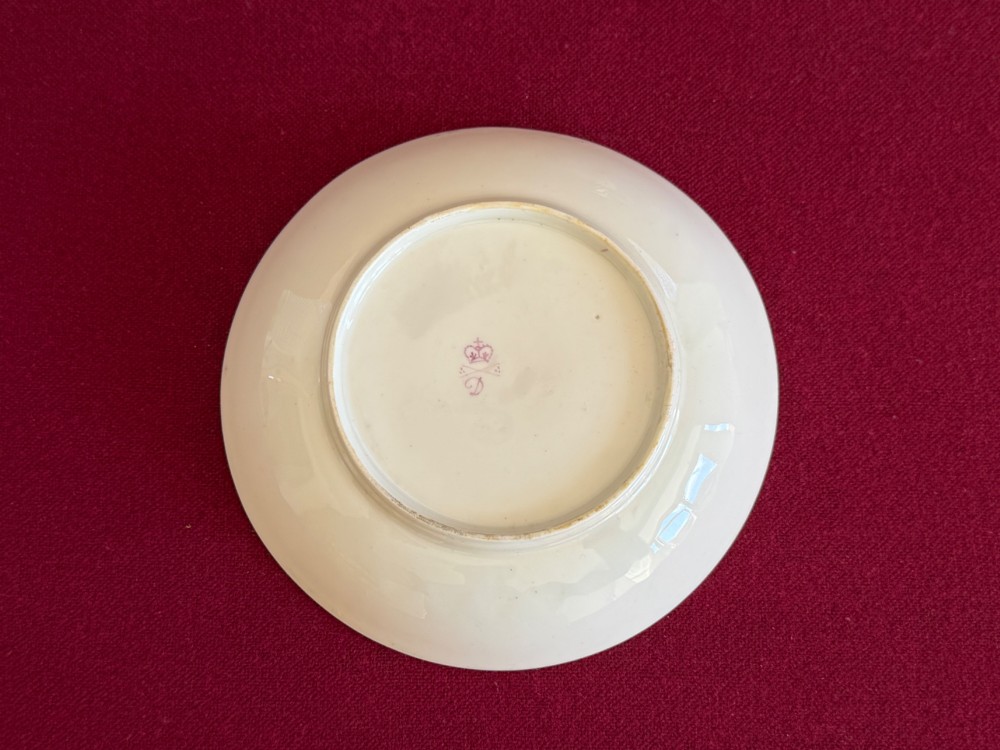 An eighteenth-century Chelsea Derby porcelain trio comprising a coffee cup, tea bowl, and saucer decorated in cobalt blue and gold leaf pattern 34. View III